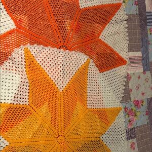 Vibrant Star Pattern Quilt in Orange and Yellow